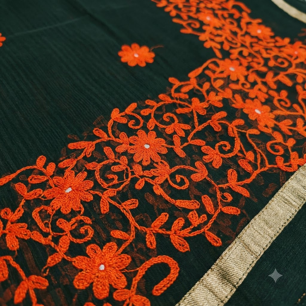 Elegant Black Saree with Vibrant Orange Floral Embroidery